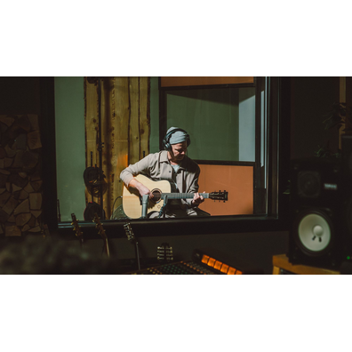 Artist recording in a studio with the TAG3 C acoustic guitar.